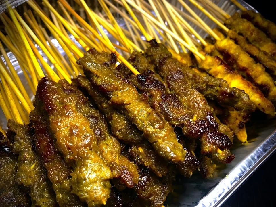 Tray of freshly grilled satay skewers